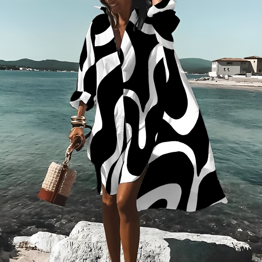 MC | Knee-length dress with unique print